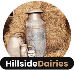 Milk bottles branded with Hillside Dairies logo.